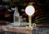 Le Coq Rouge – där Frankrike möter Helsingborg french bistro interior warm lighting wine glasses — Foto: Natalia Y. / Unsplash